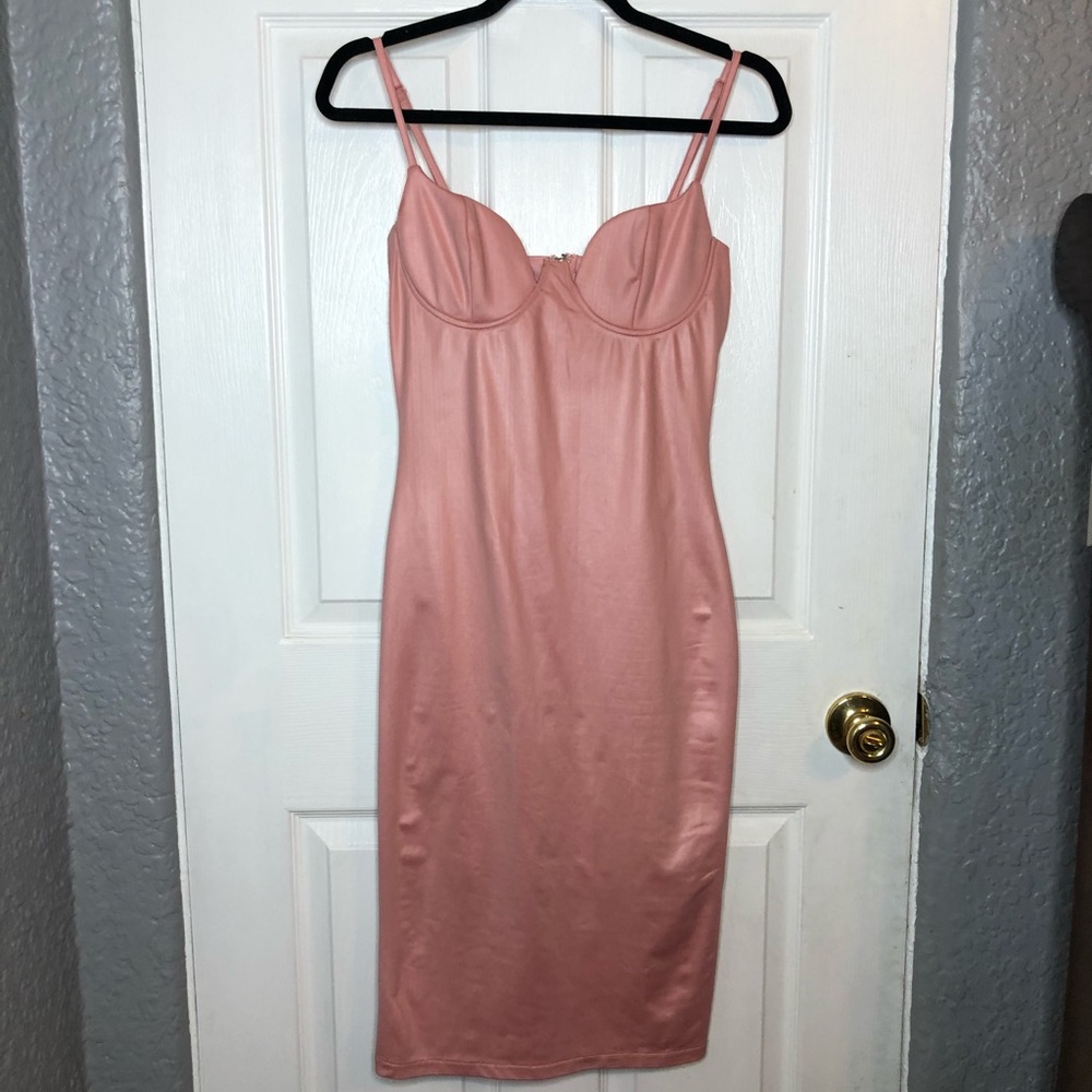 Skin tight, light pink dress